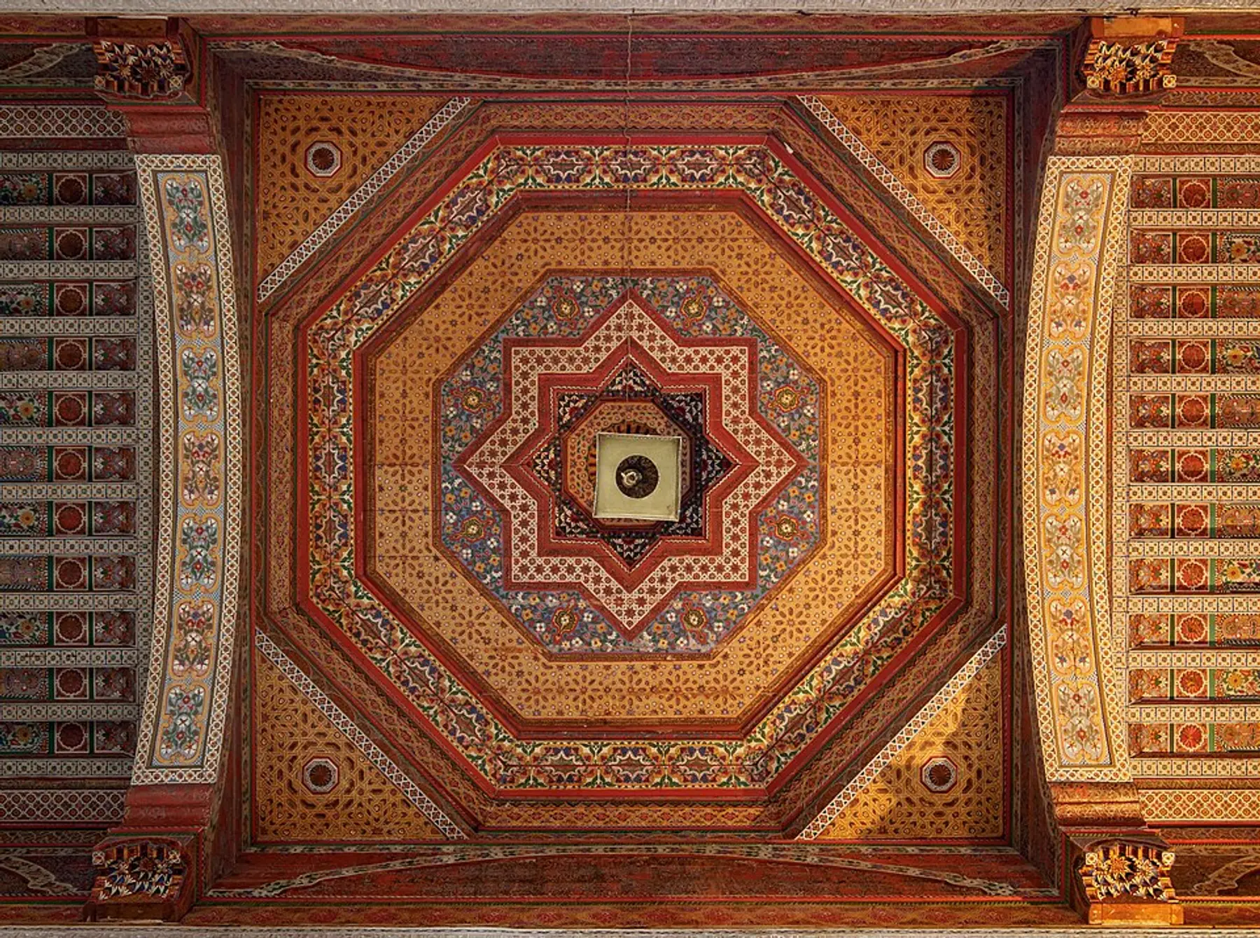 Painted and gilded cedar ceiling inside the Bahia Palace, Marrakech